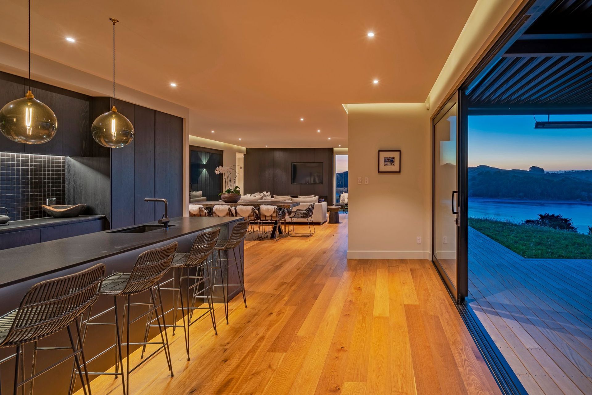 A bespoke lighting design makes the space feel modern and welcoming.