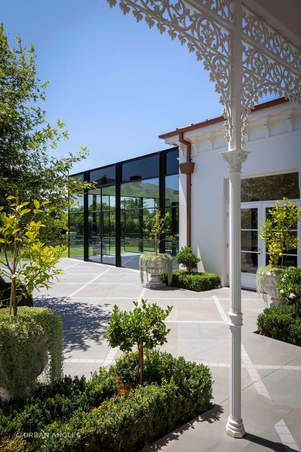 Ornate detailing remains as a contrast to the modern extension.