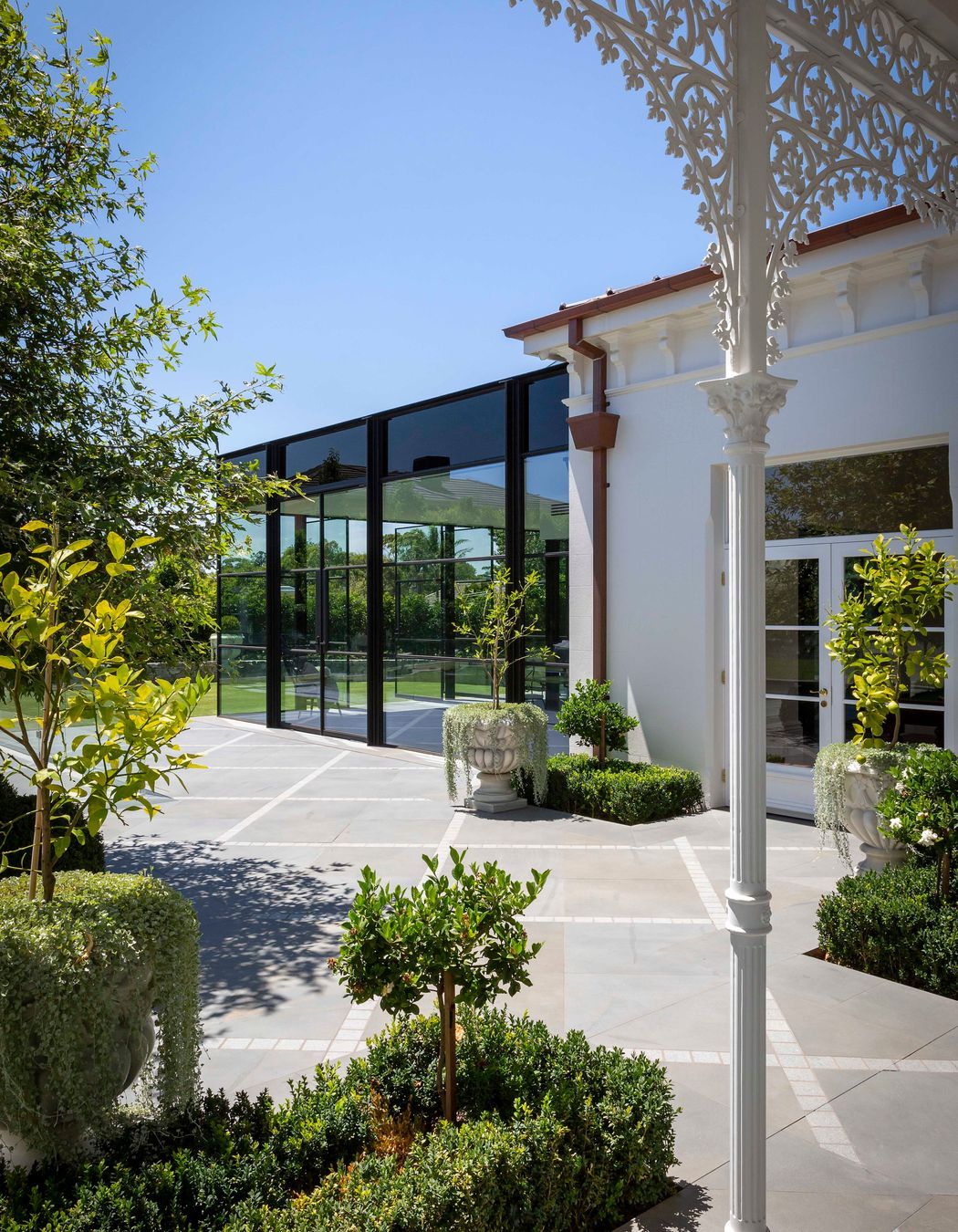 Ornate detailing remains as a contrast to the modern extension.