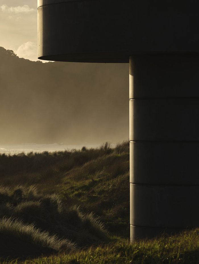 A close look at the precast concrete and cantilevered upper level.