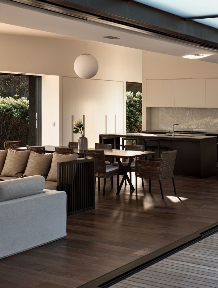 The elegant living spaces have seamless indoor-outdoor flow.