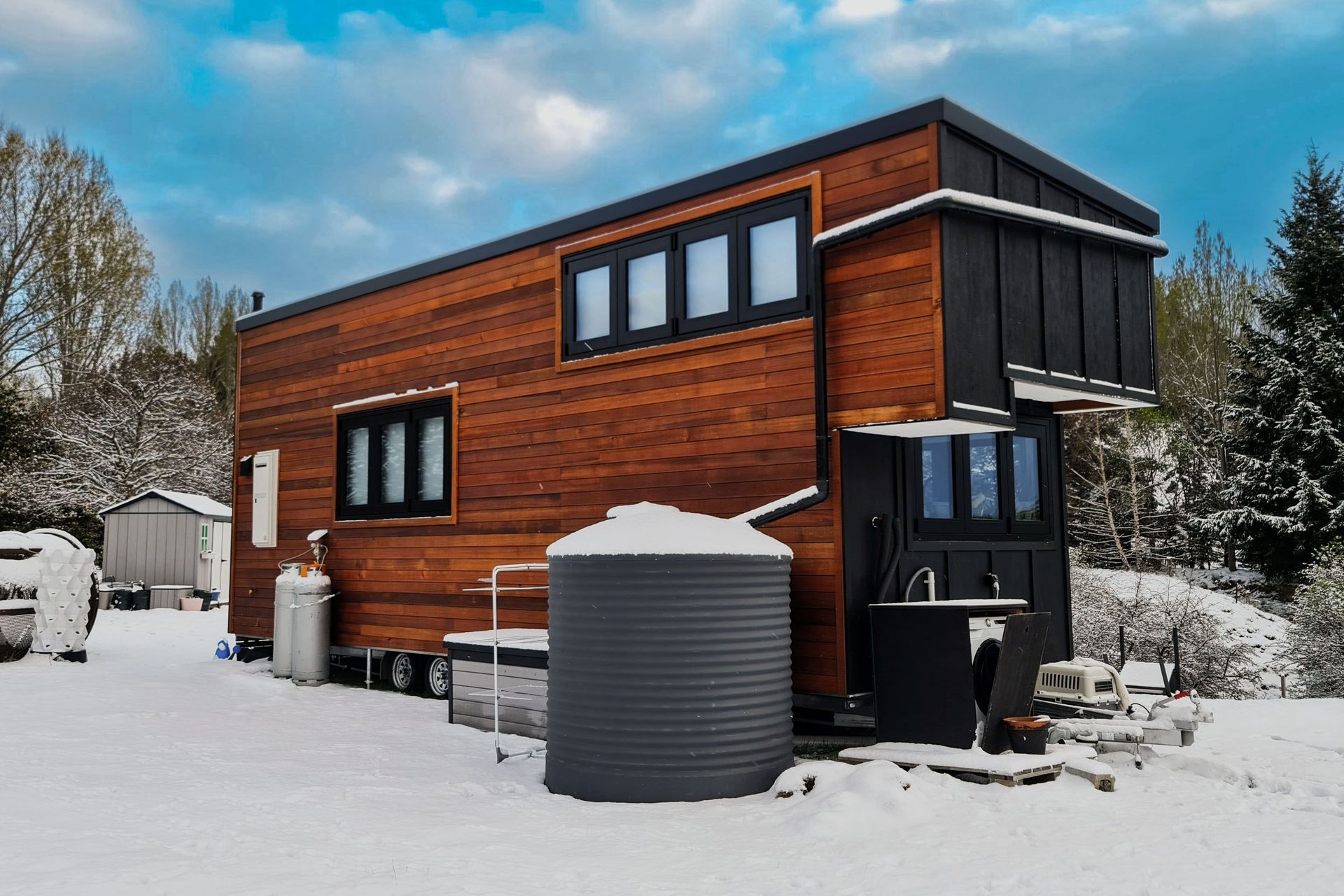 The Promax 3,000 litre ENDURO water tank fitted here is one of the many great solutions to utilities in this cosy and stylish tiny home in Central Otago