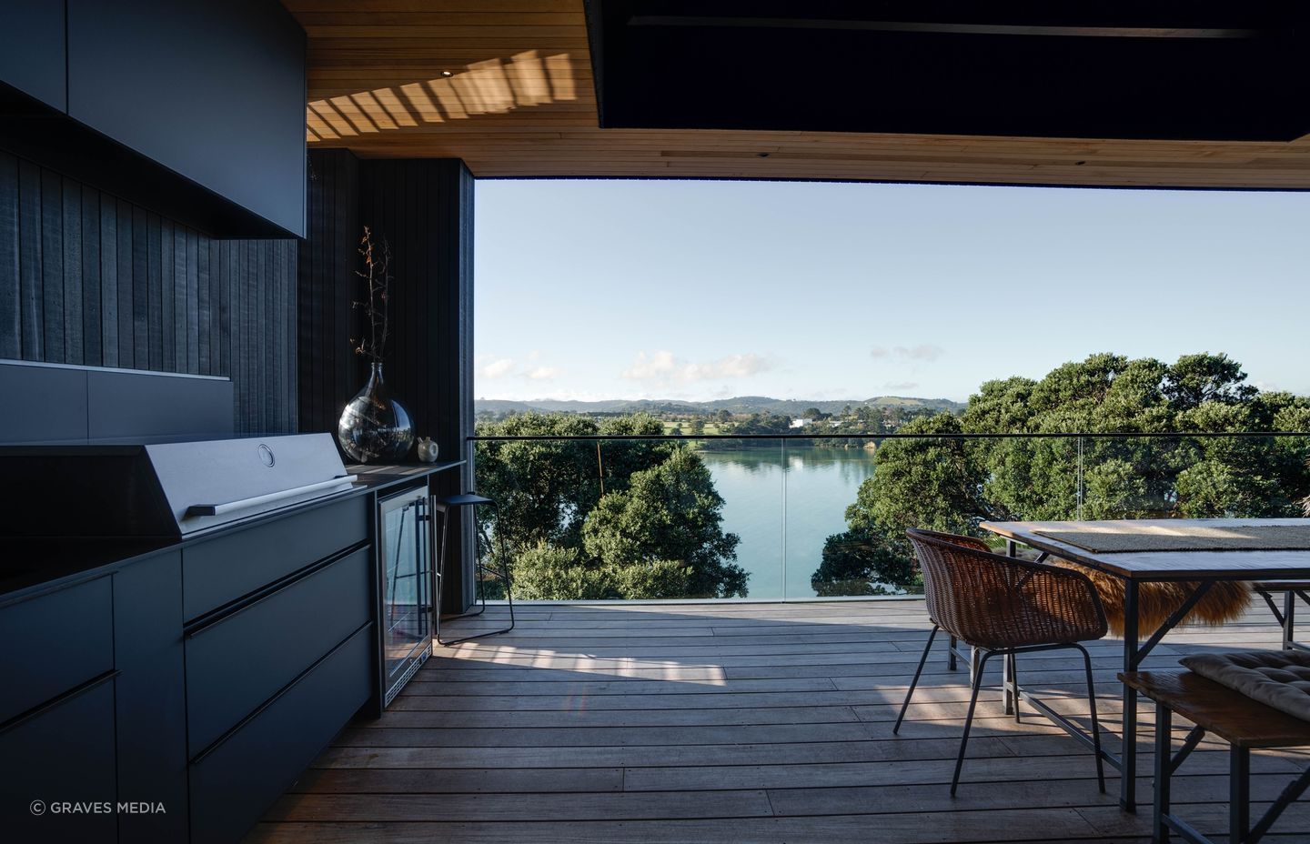 Pōhutukawa frame the view from the northeasterly deck.