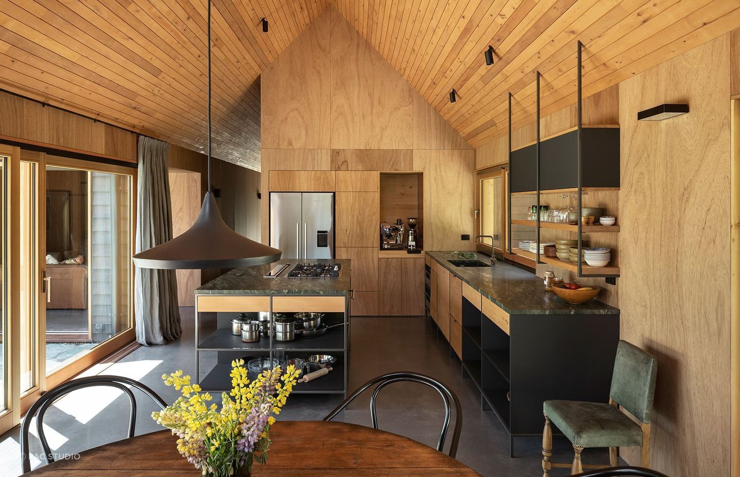 Timber panelling and finishes are ever-present throughout the homely interior. | Photography: Simon Devitt