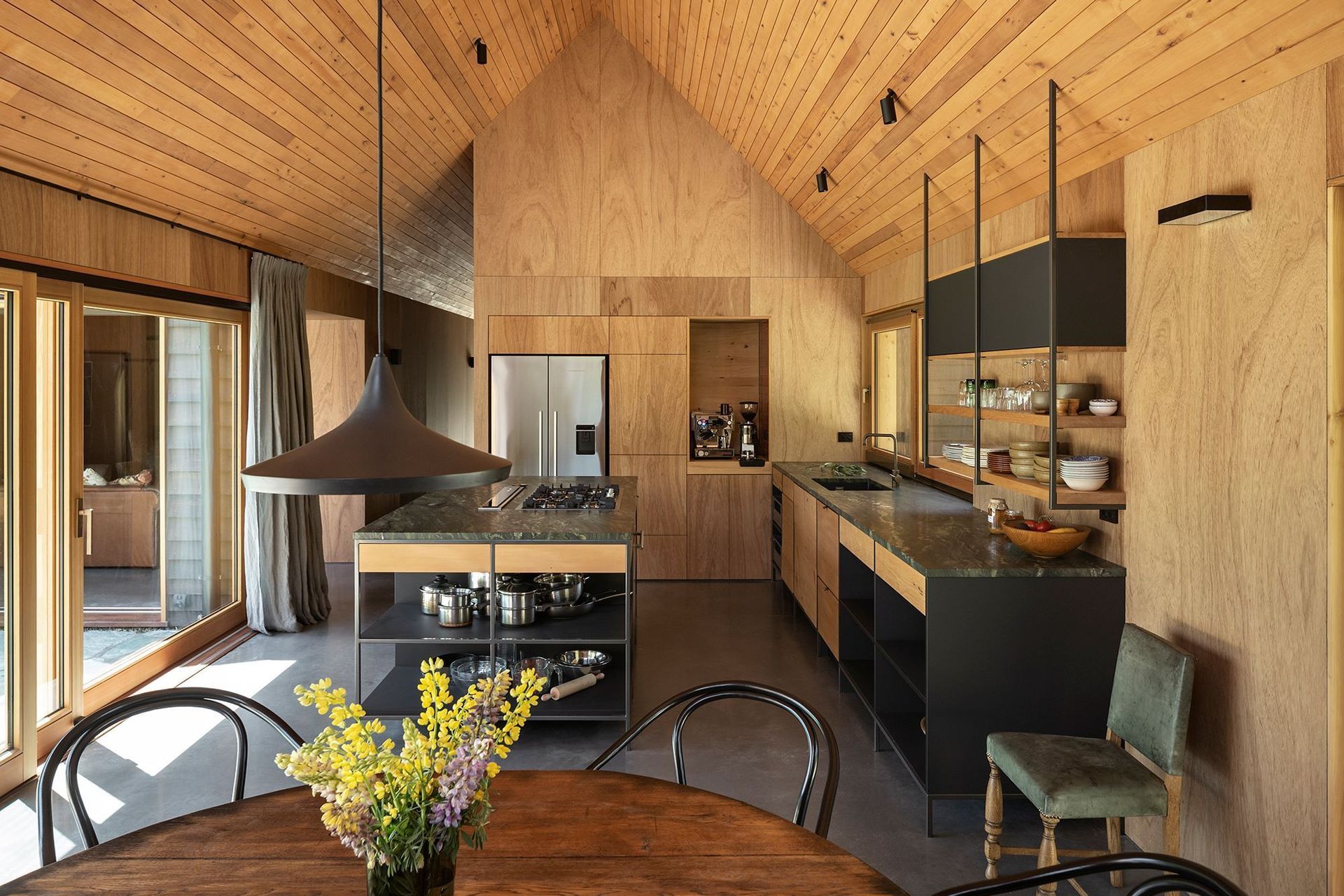 Timber panelling and finishes are ever-present throughout the homely interior. | Photography: Simon Devitt