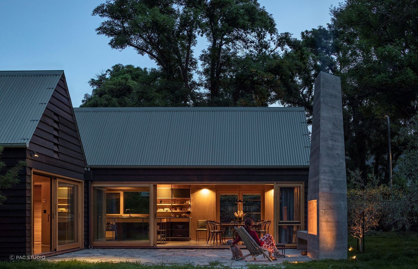 A wonderful outdoor living space with an magnificent outdoor fireplace to enjoy. | Photography: Simon Devitt
