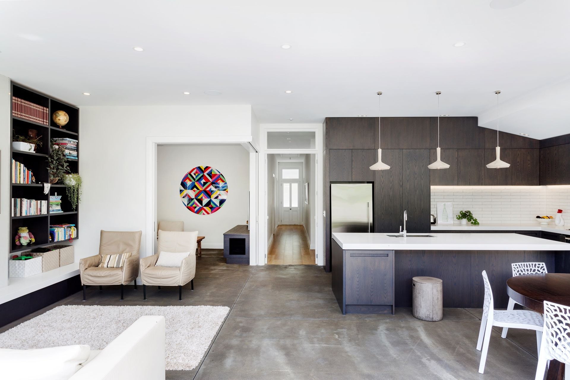 The villa's rear extension accommodates the kitchen and living spaces, leaving the bedrooms to the original part of the home.