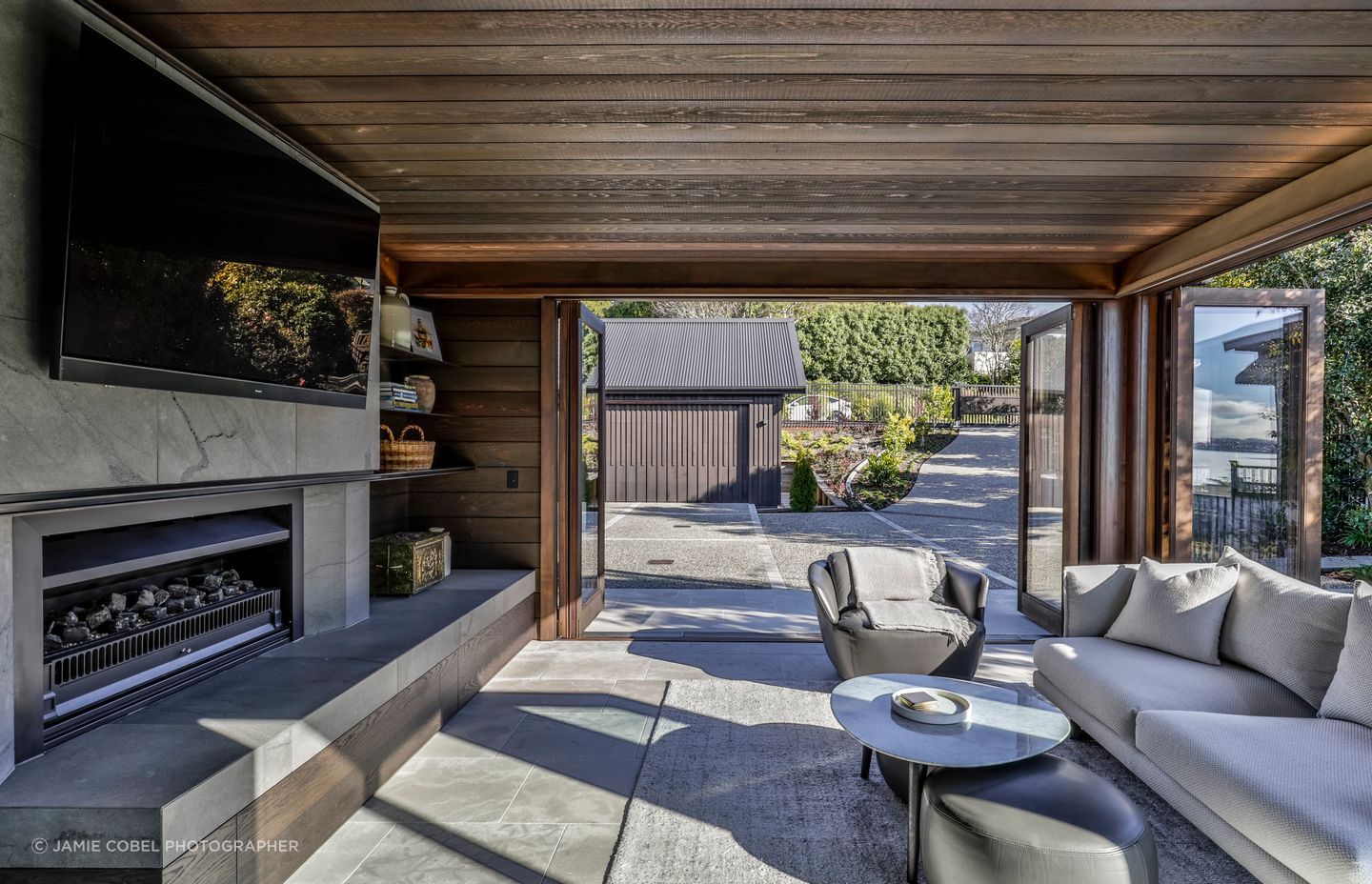 Opening completely on two sides, the sunroom is a true indoor-outdoor space.