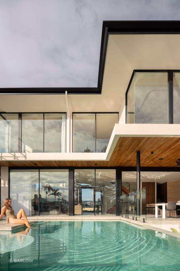 Step straight into the pool from the home's open-plan living space.