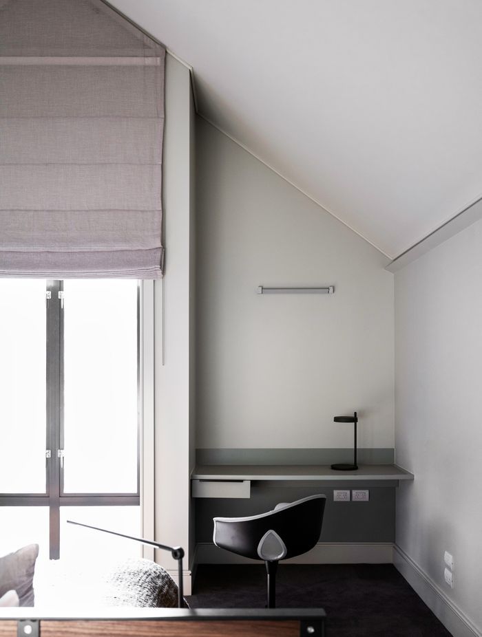 A clever office nook was created in the master bedroom.