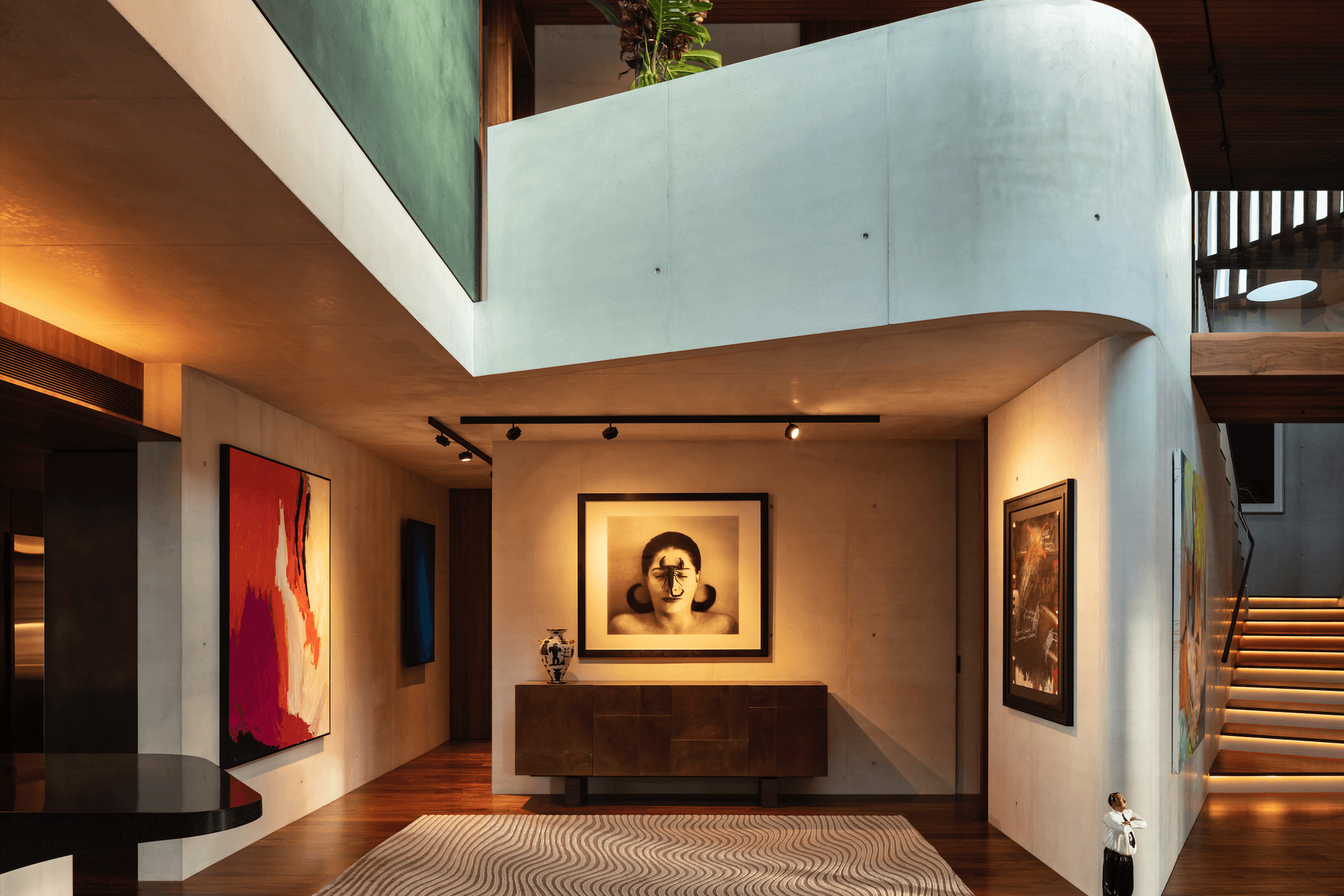 Innovation in concrete is on display throughout the interior of this project, with curved forms coloured in PeterFell's SuperWhite Plus oxide.