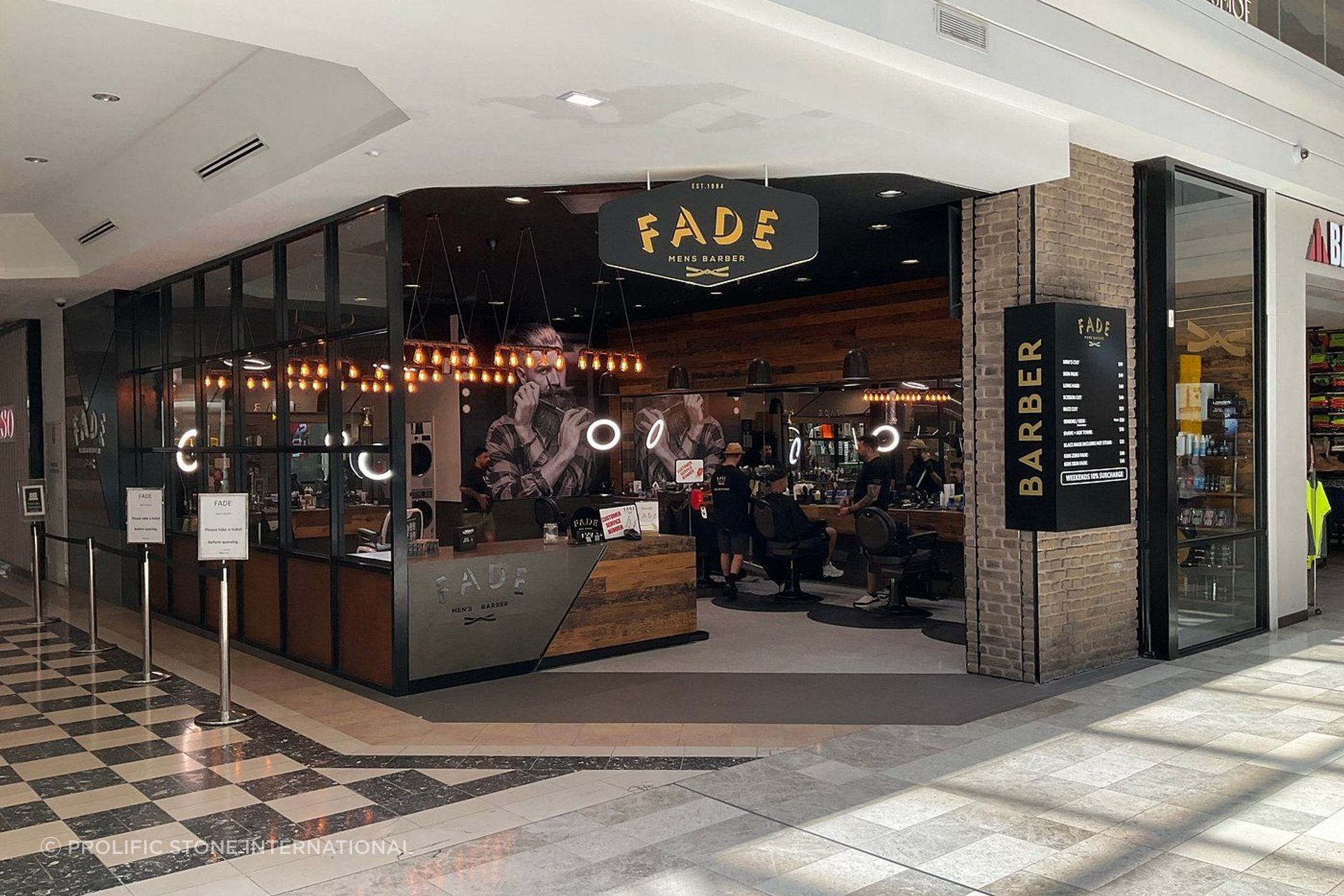 Distinct to each of the three floors, the marble tile designs feature a selection of colours, functioning as both an aesthetic element and a practical lease line.