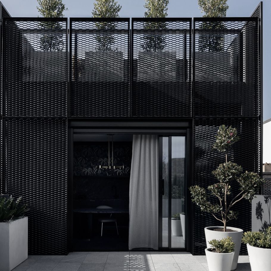 Two architectural typologies converge in this multifunctional office and home in Albert Park