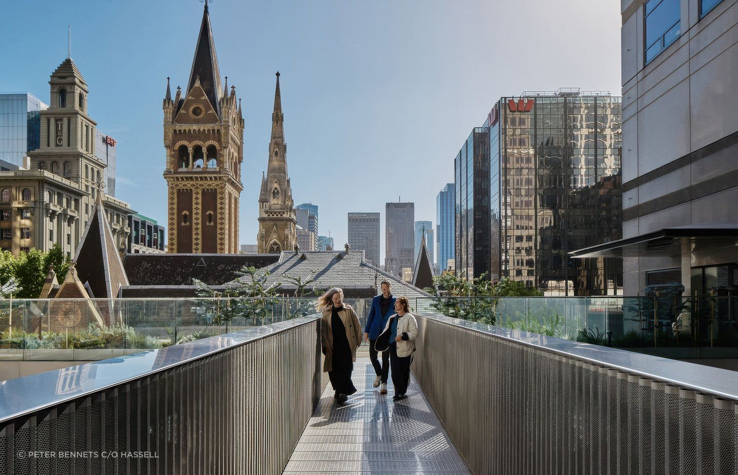 Opening up the foyer to the rooftop allows natural light to make its way deep into the building, while providing views over Melbourne.