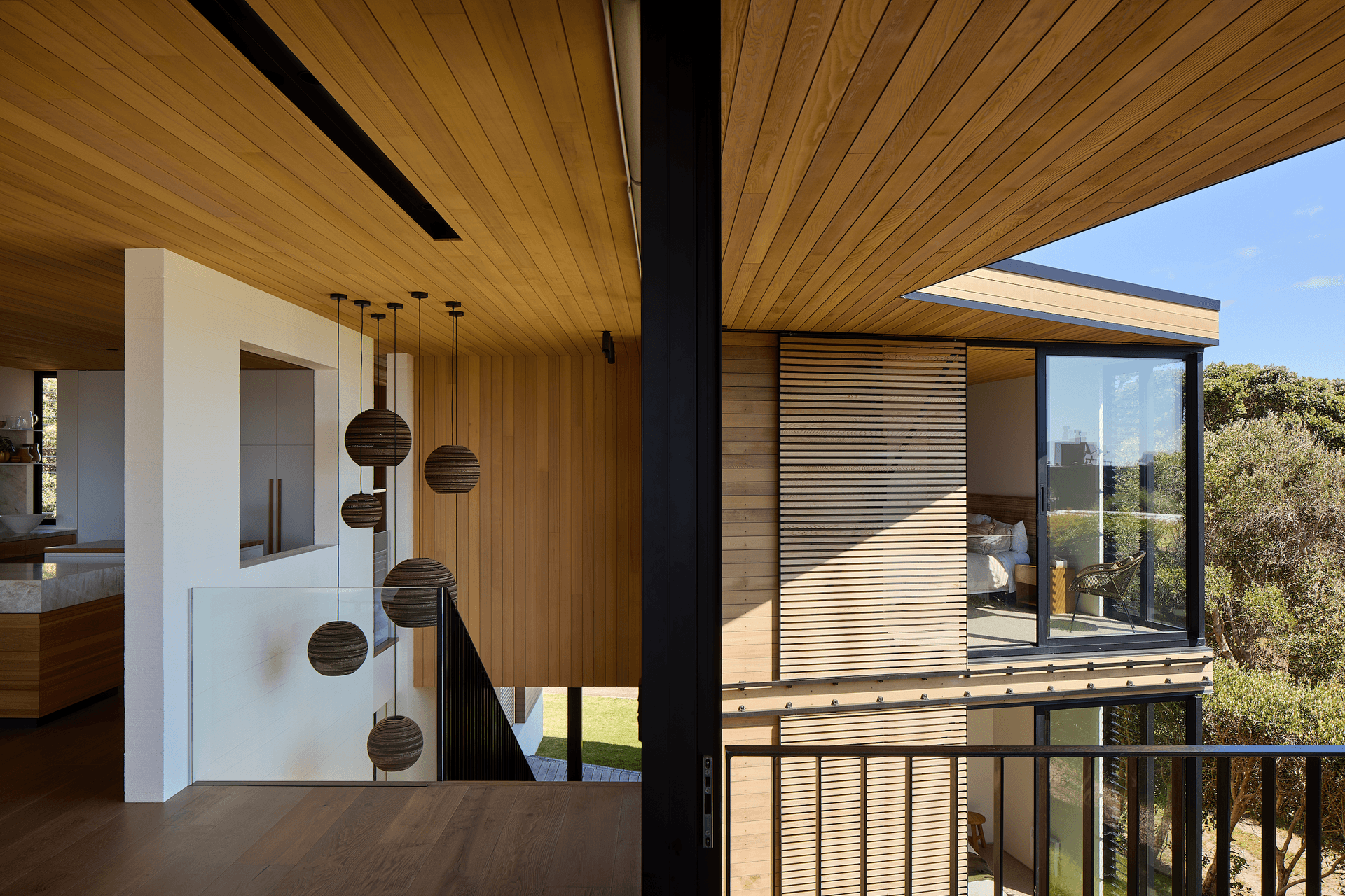 Every room maximises the view, with floor-to-ceiling sliding doors welcoming in the natural light.