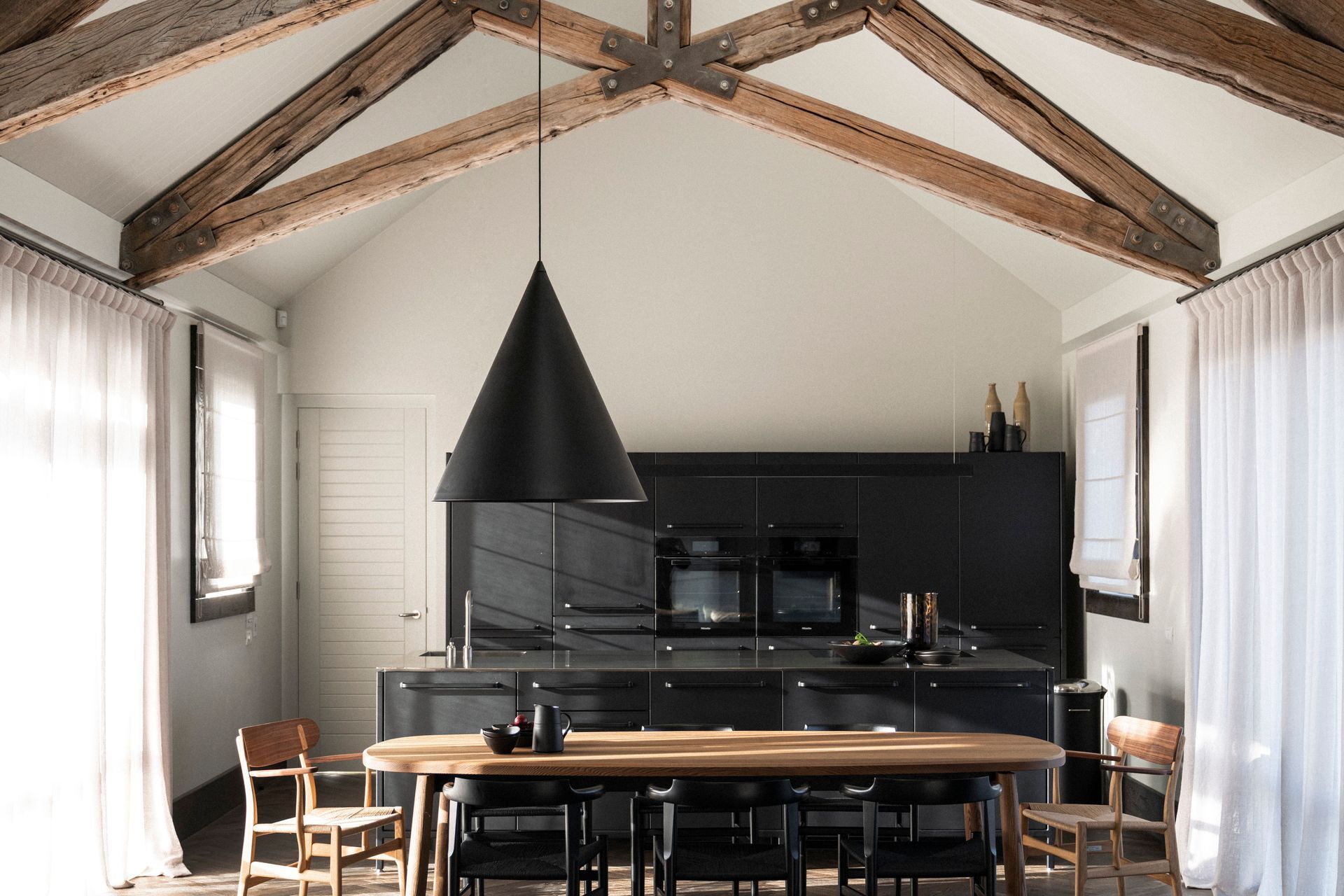 "Our approach is 'How do we heal the building?' We often feel there's something in it that needs to be removed to take it back to what it originally wanted to be," says Anna-Carin. In this case beading and plasterboard were removed to expose the oak beams in their raw state.