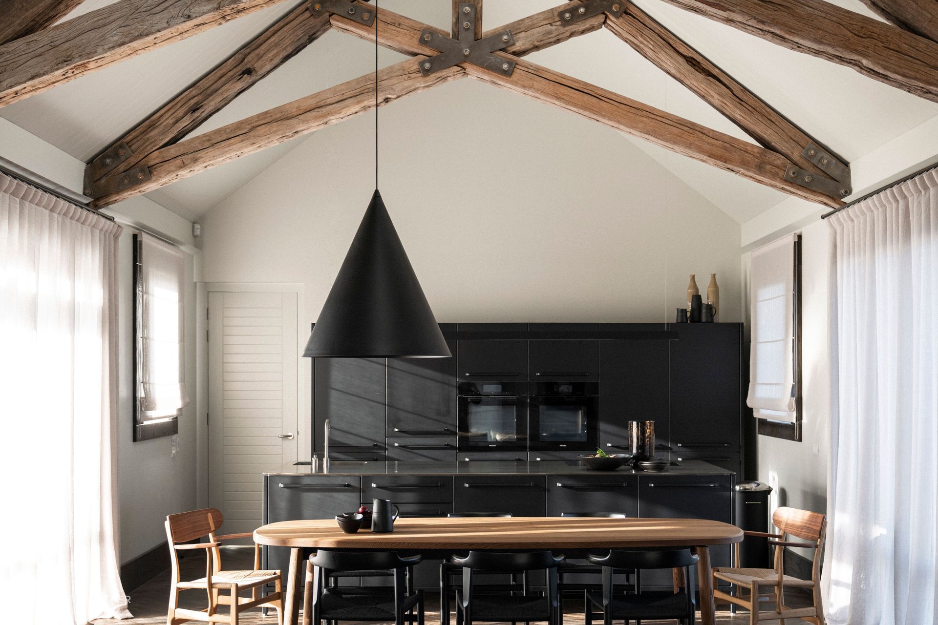 "Our approach is 'How do we heal the building?' We often feel there's something in it that needs to be removed to take it back to what it originally wanted to be," says Anna-Carin. In this case beading and plasterboard were removed to expose the oak beams in their raw state.
