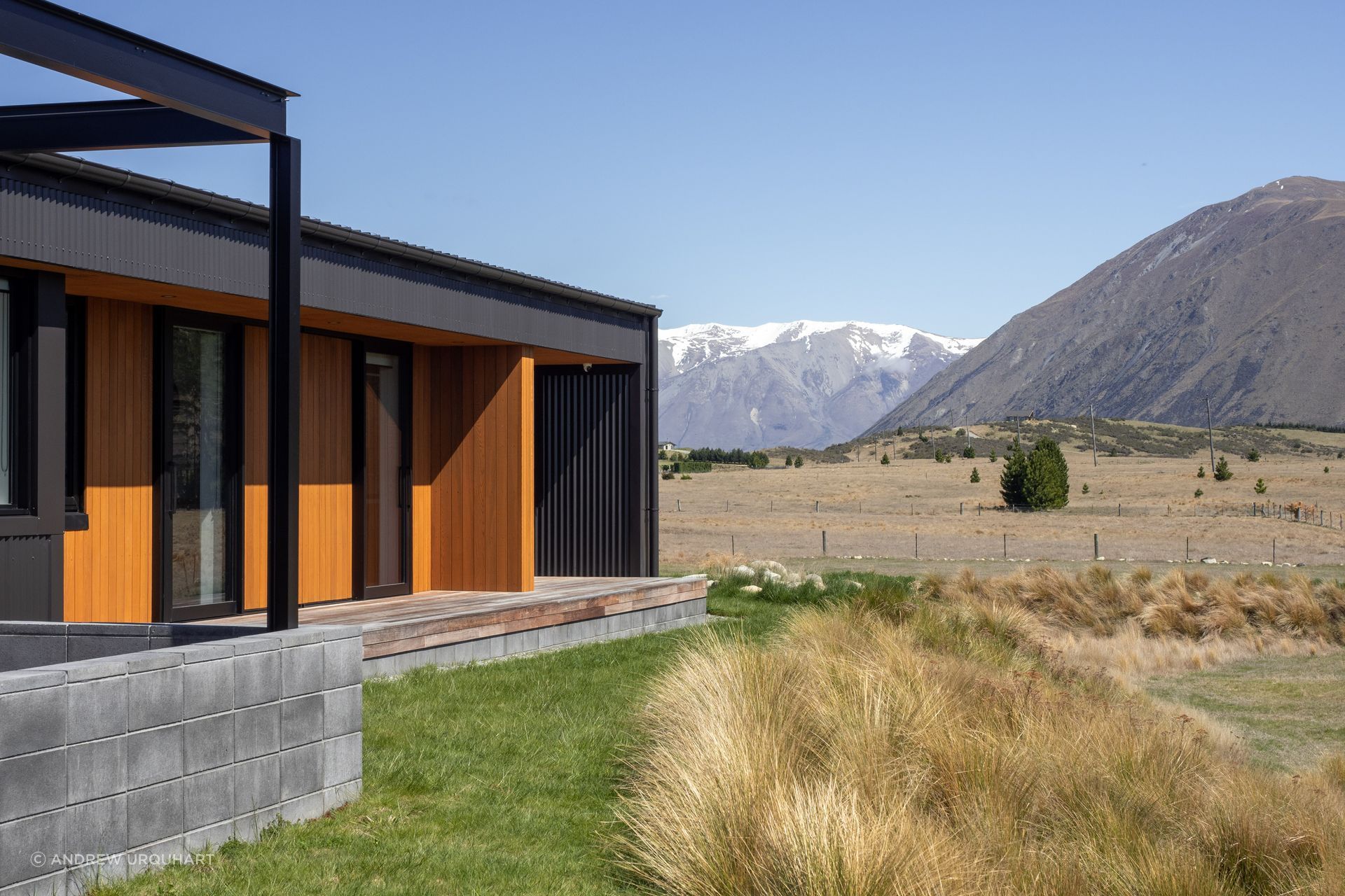 Beth says the cedar cladding is only in areas within easy reach. “They can access it and re-stain it without requiring scaffolds and ladders.”
