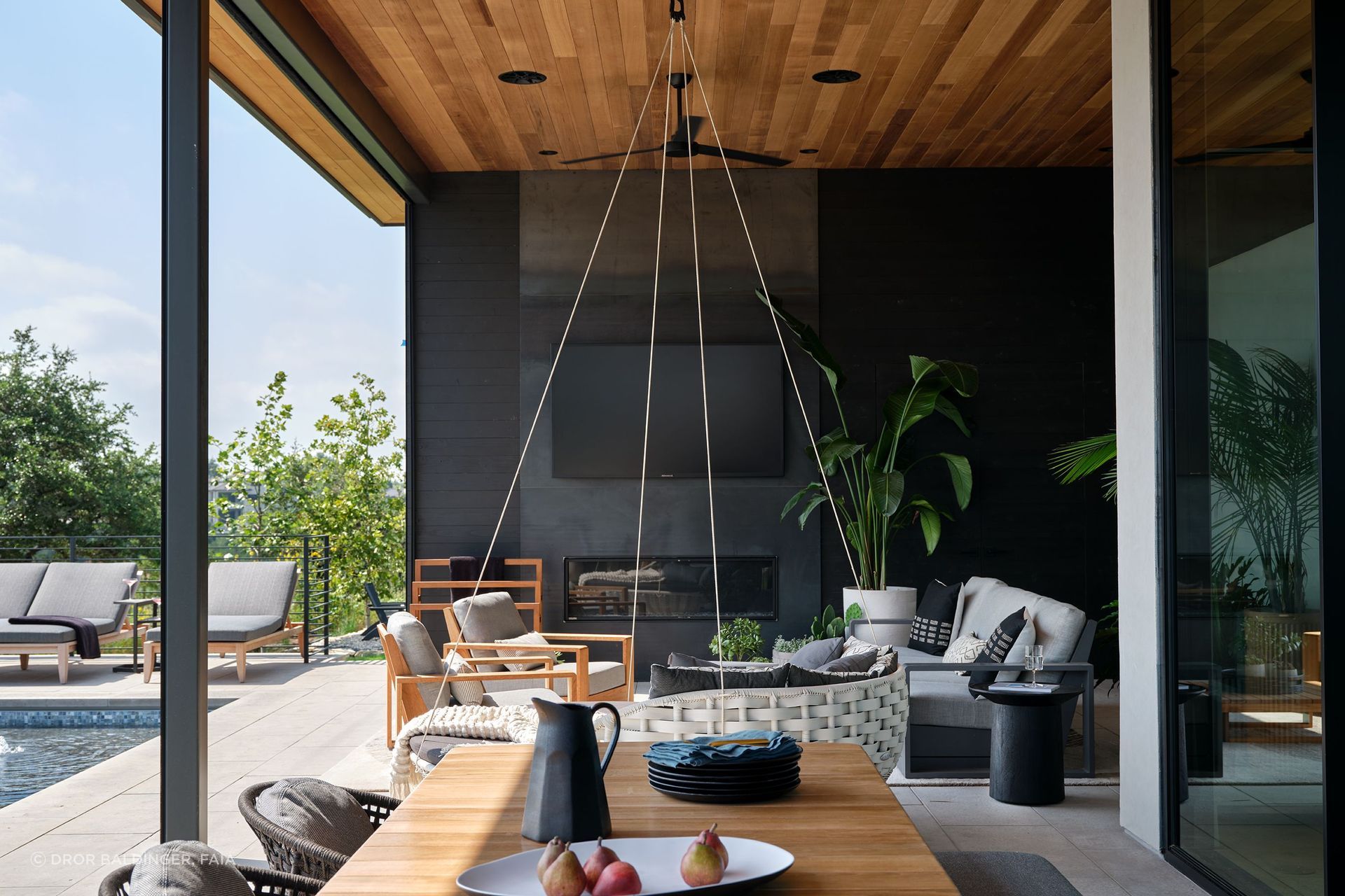 This Austin project by Britt Design Group showcases a relaxed entertaining and dining space complete with retractable shades.