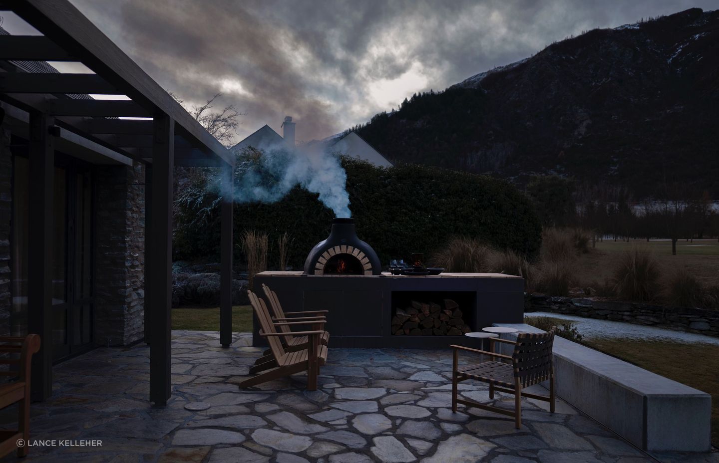 The crazy paving reflects the materiality of the area; the outdoor space was designed in conjunction with local landscapers.