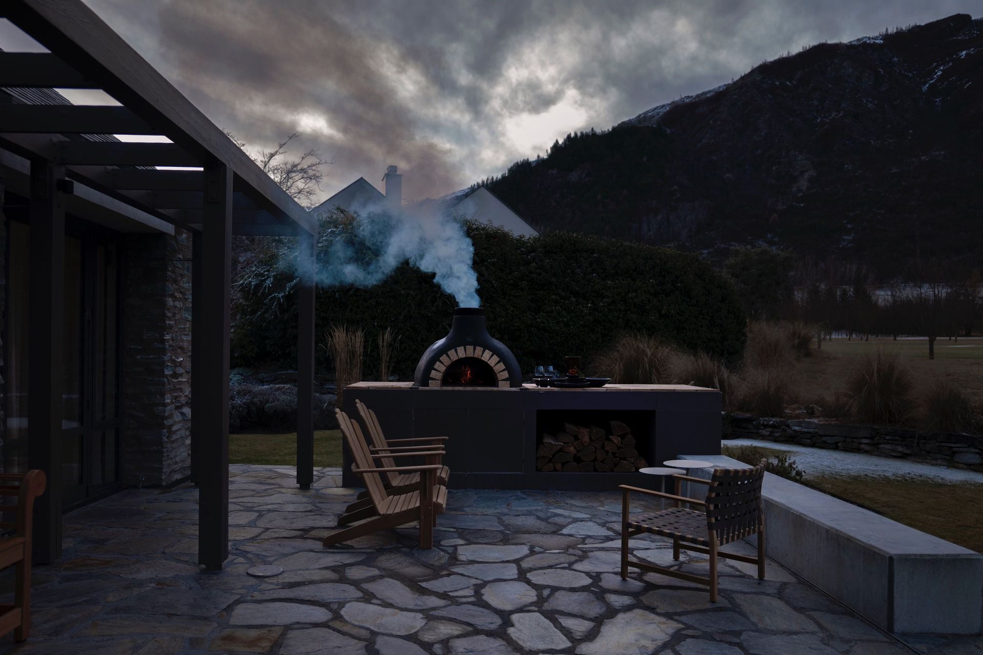 The crazy paving reflects the materiality of the area; the outdoor space was designed in conjunction with local landscapers.