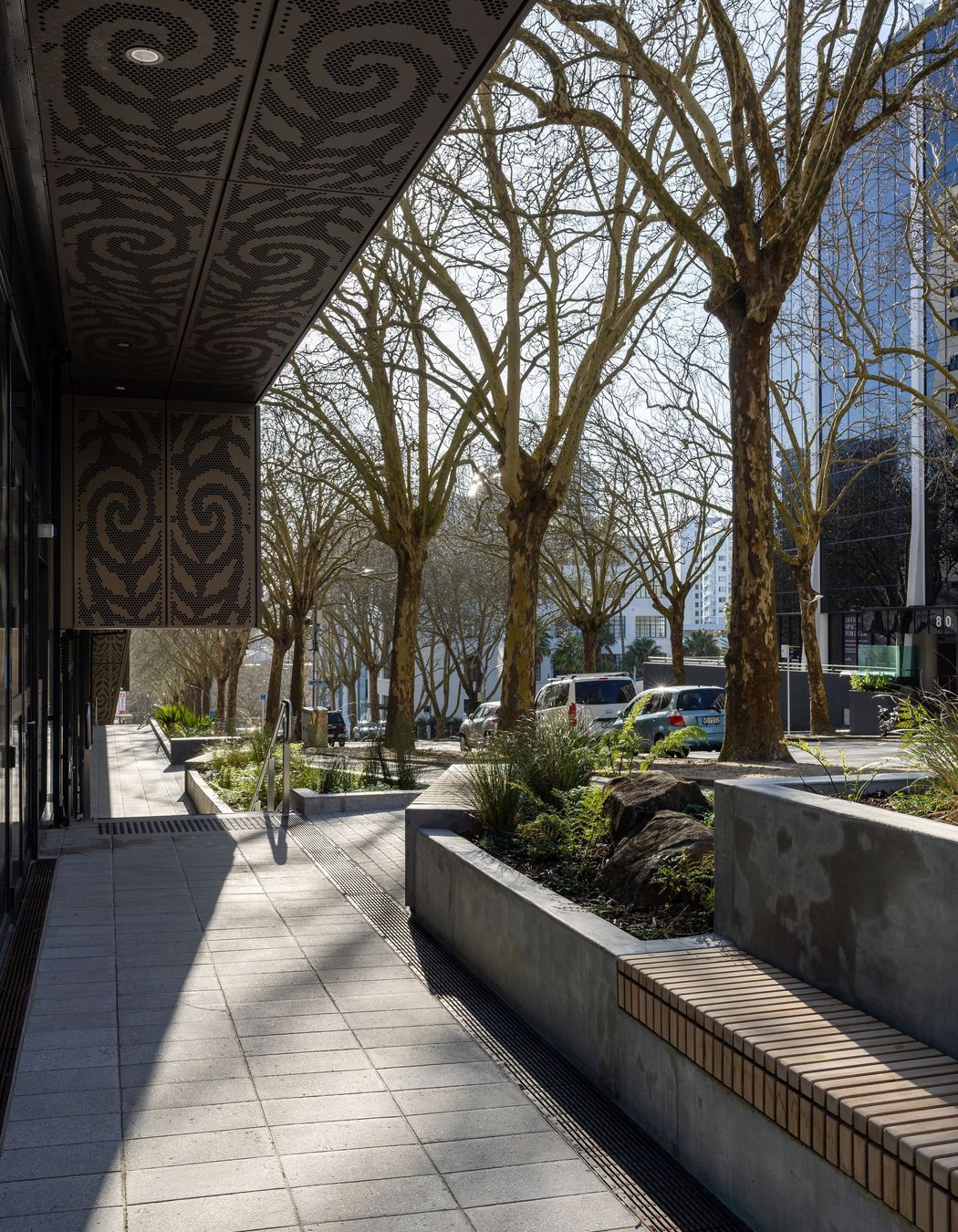 The beautiful koru patterns designed by Katz can be experienced up close along the street frontage of Te Mātāwai.