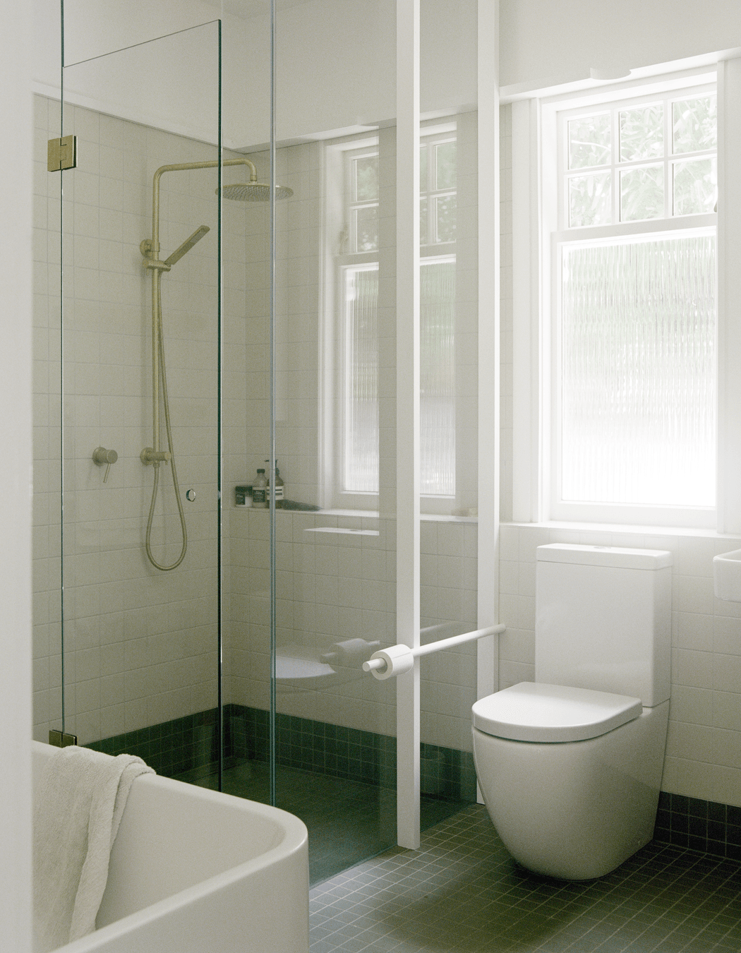 The simple yet clever toilet roll holder is a favourite design move from Parsonson.