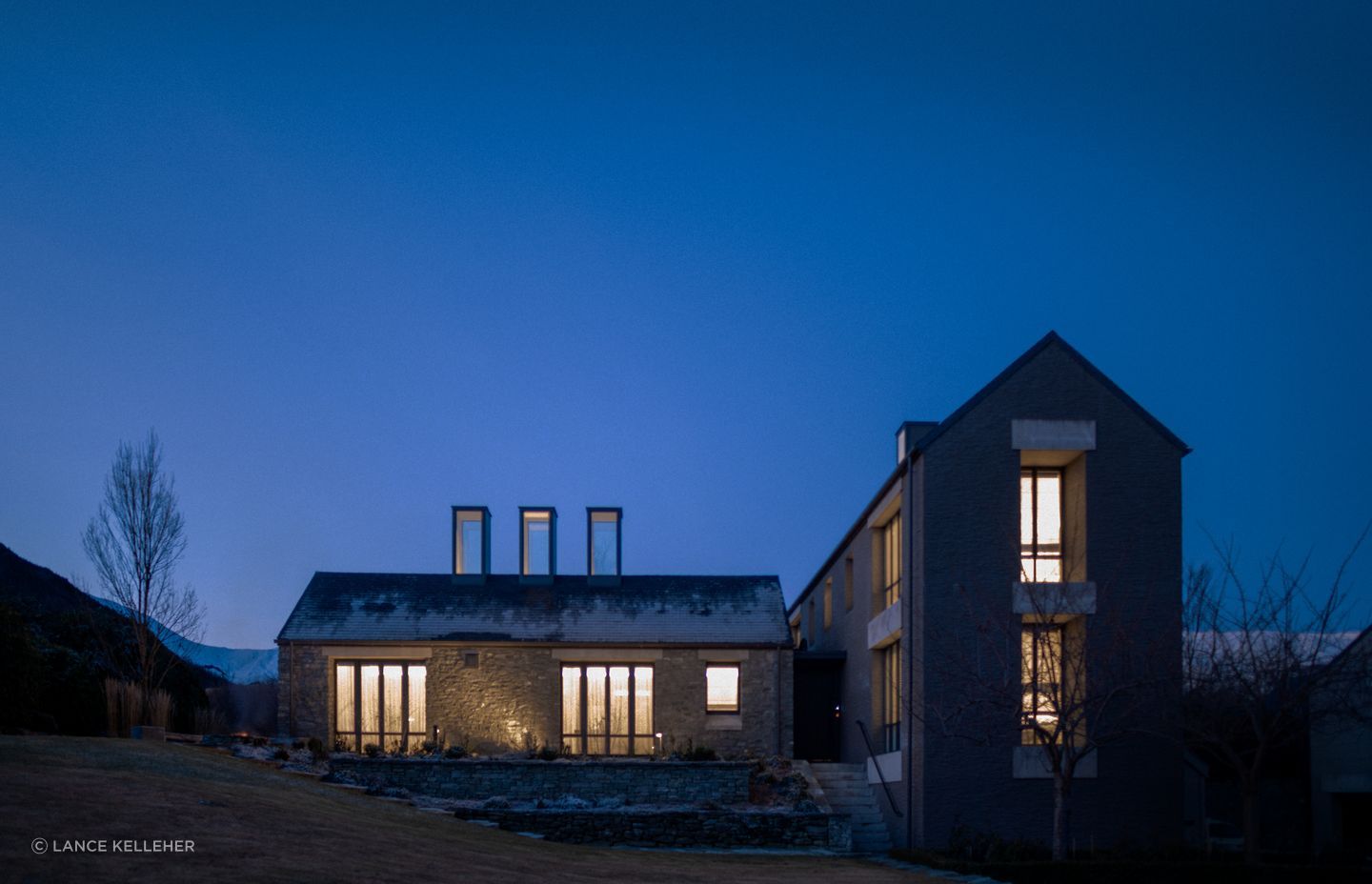 The original building, built in the early-2000s references the early stone buildings found in the area, and was unchanged in the refurbishment, apart from the front door, which was replaced with a more substantial door, befitting the architecture.