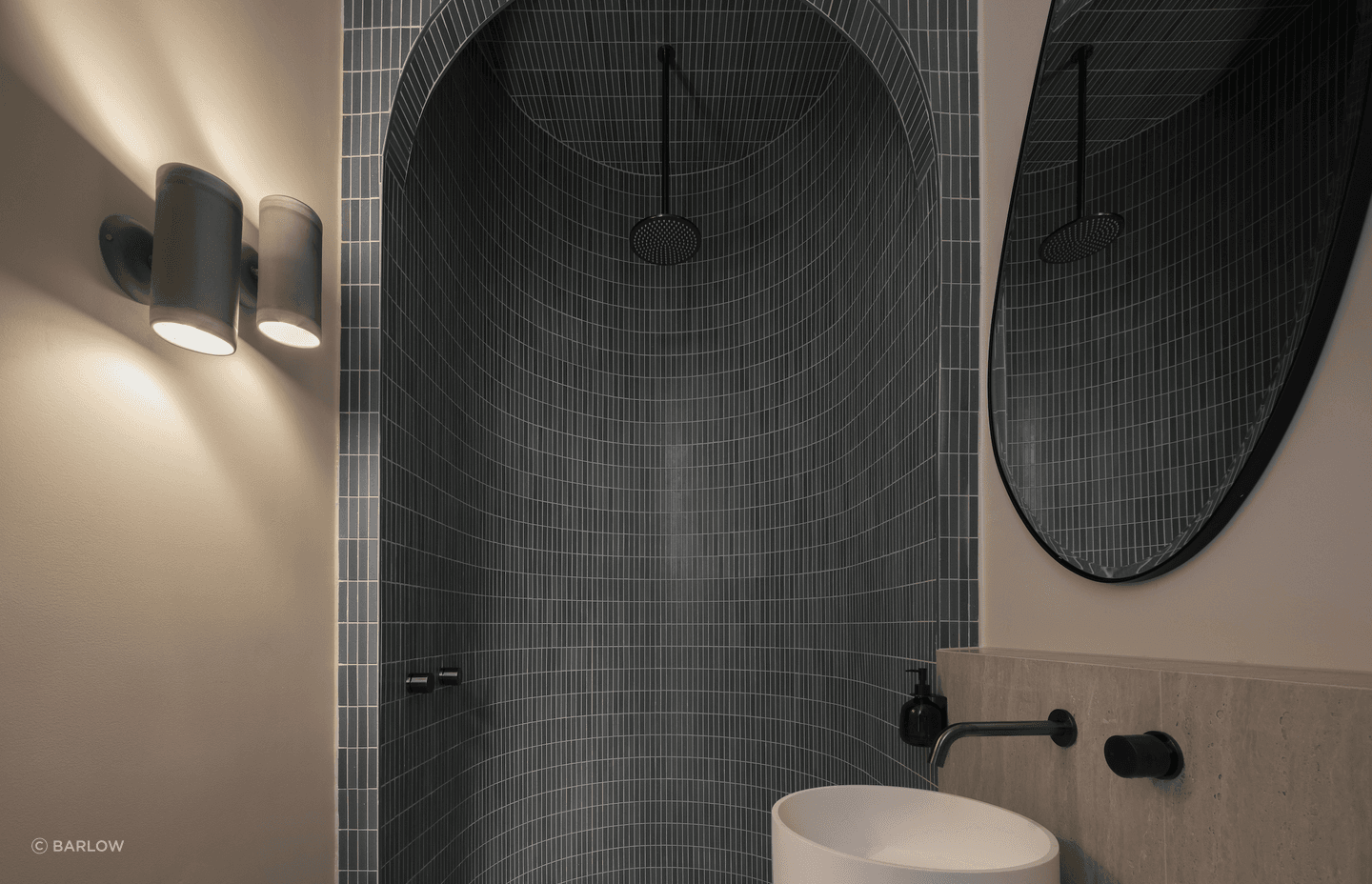 Handmade tiles add colour and texture to the downstairs bathroom.