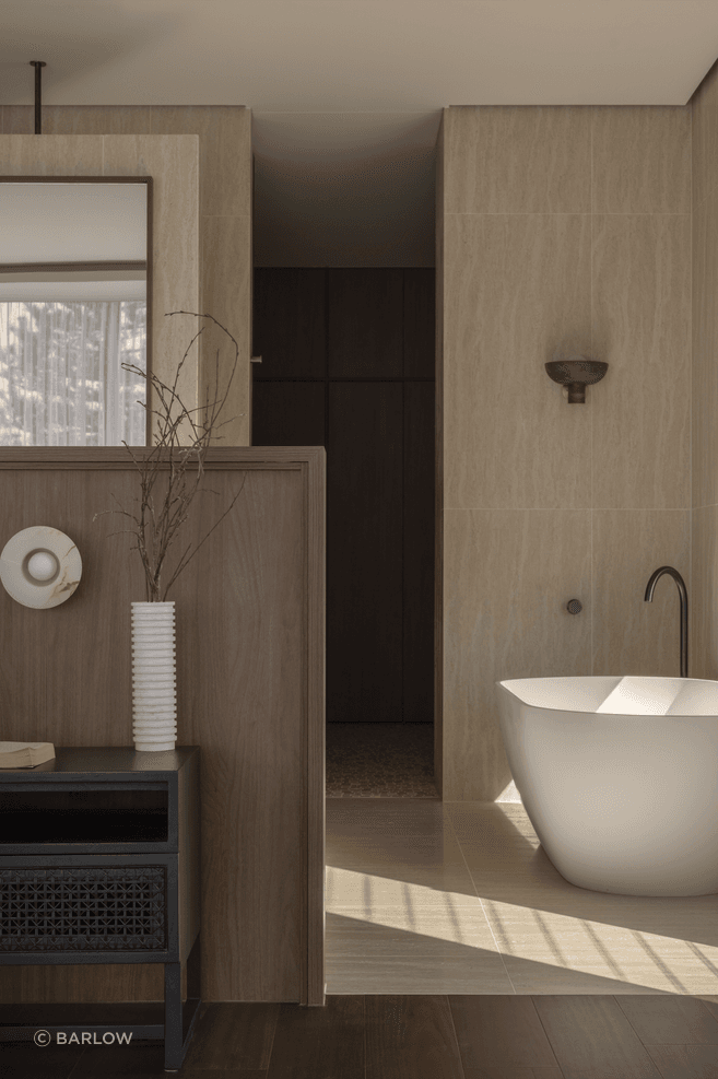 Taking cues from the ground floor, the master suite is open-plan.
