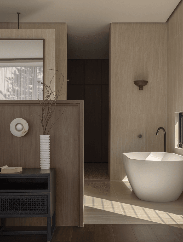 Taking cues from the ground floor, the master suite is open-plan.