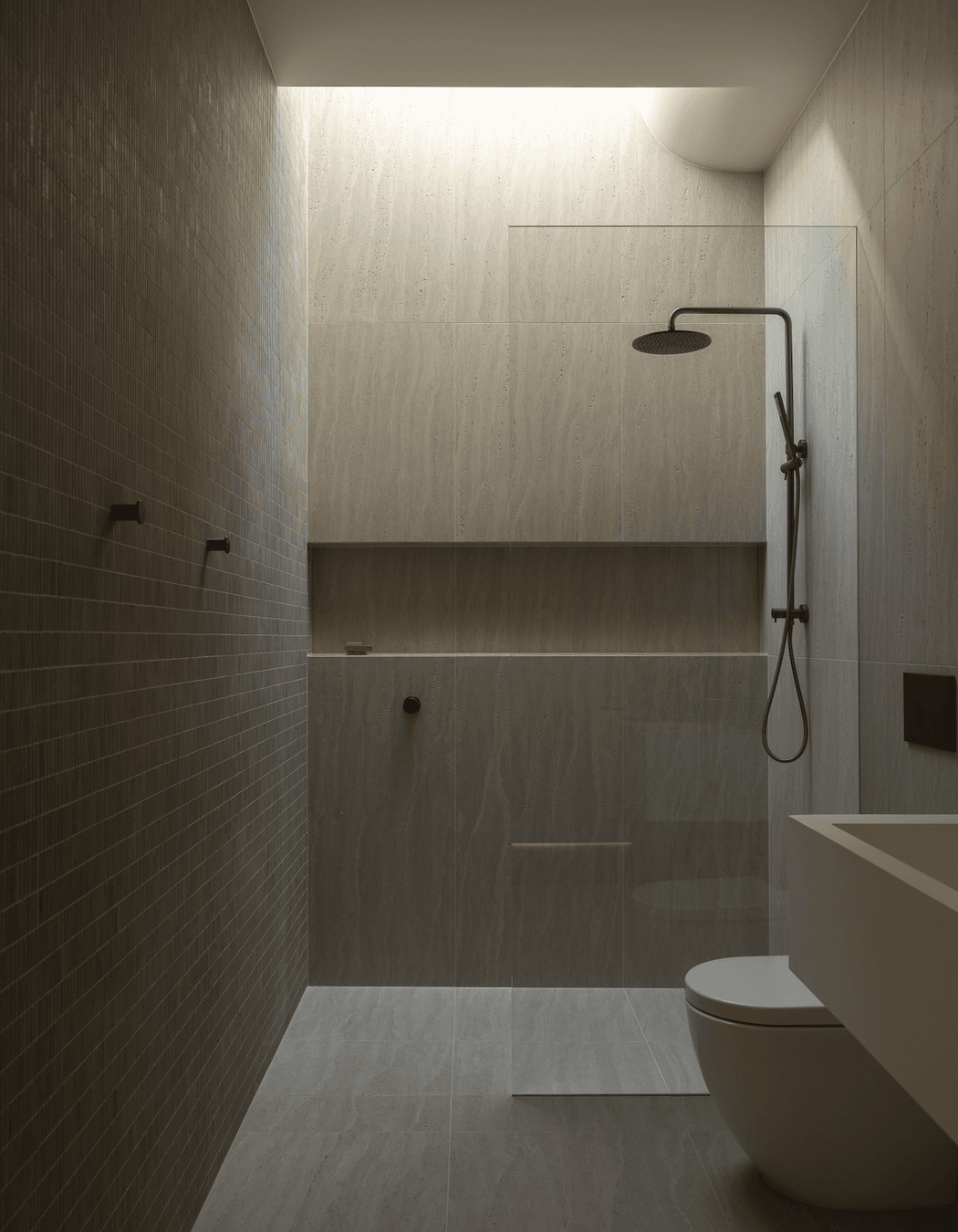 Light is welcomed in from above with the curved ceiling a reference to other parts of the home.