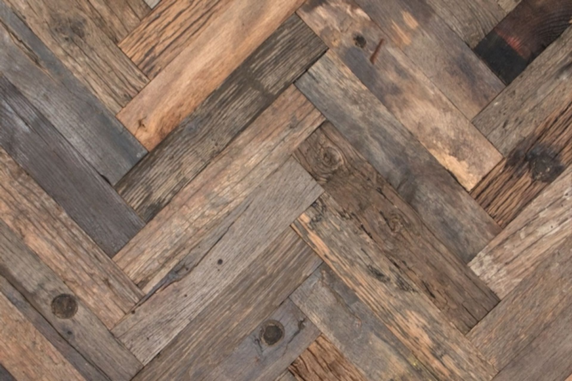 The natural wear and tear of repurposed wood is impossible to replicate.