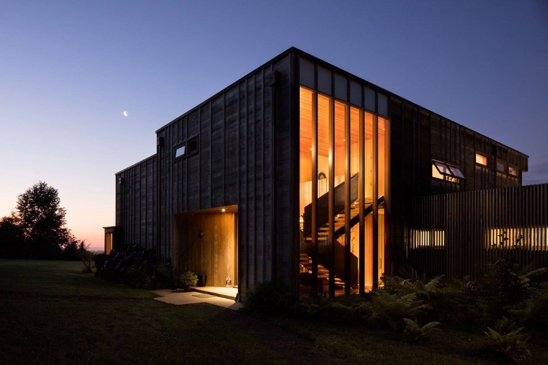 The highly detailed Bach Bach by night. By Crosson Architects, photo by Jason Mann Photography. 