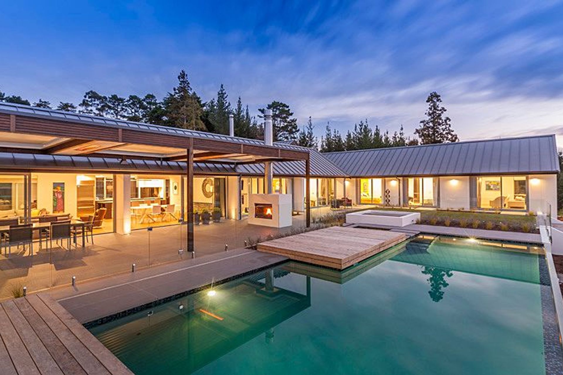 Scale and proportion are important for pool design. This pool easily sits into the house enclosure, with almost seamless connection.