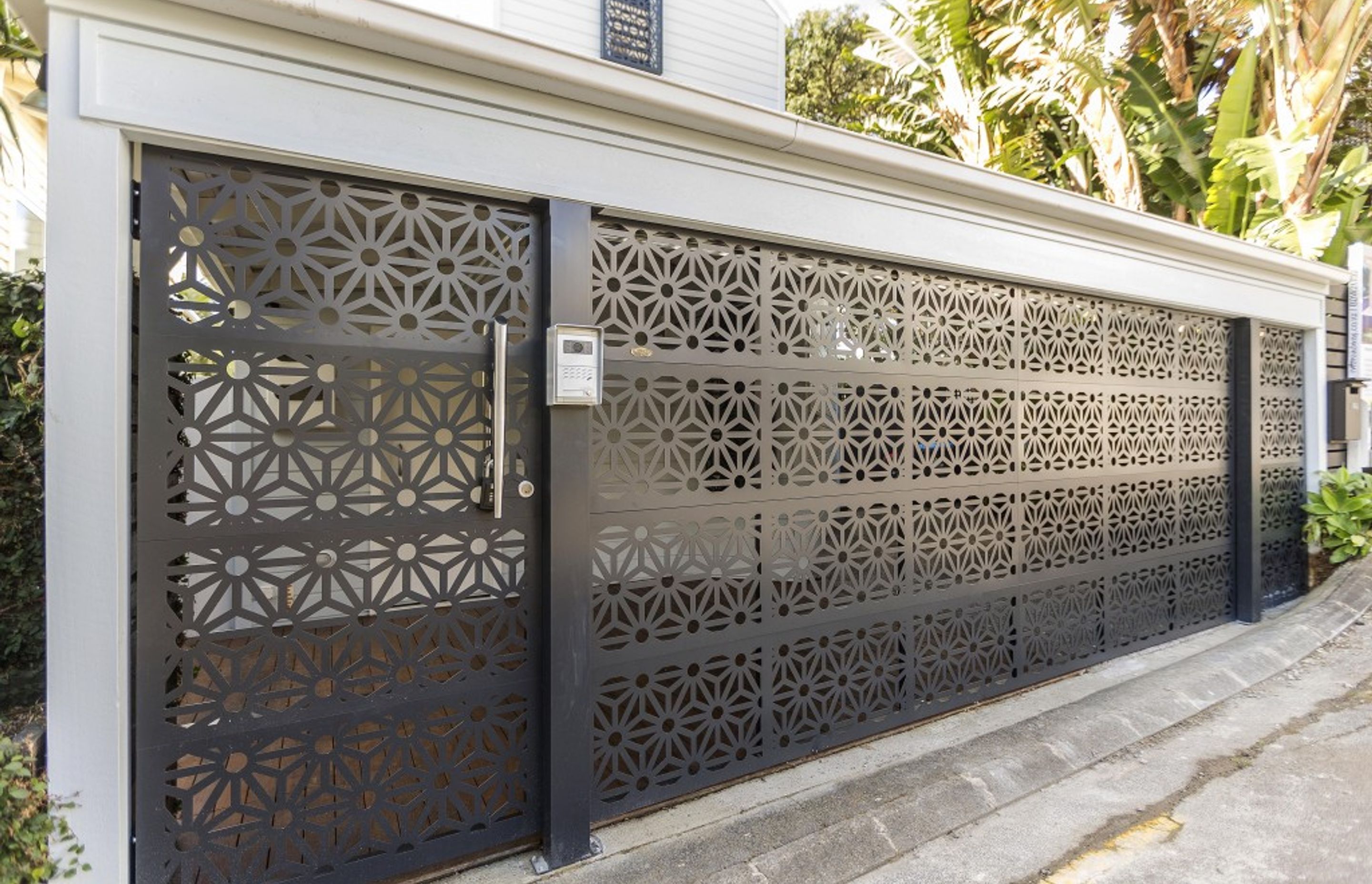 Designs for custom perforated garage doors, pedestrian gates and fences are only limited by your imagination