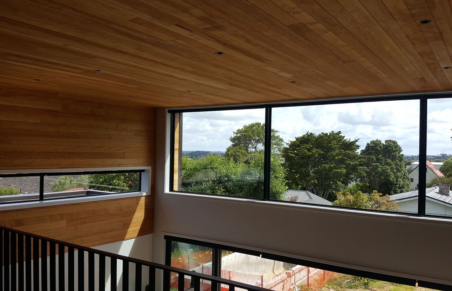 The warm tones of western hemlock work well for residential walls and ceilings.