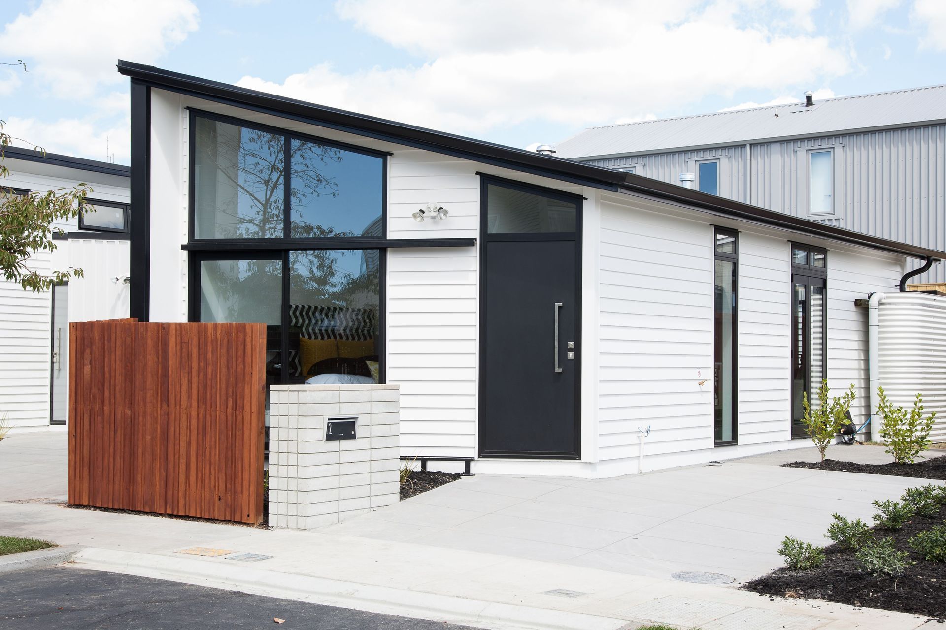 Good design is a selling point for the small but efficiently organised, mid-price Axis Series homes at Hobsonville Point, Auckland, by Architecture Workshop.