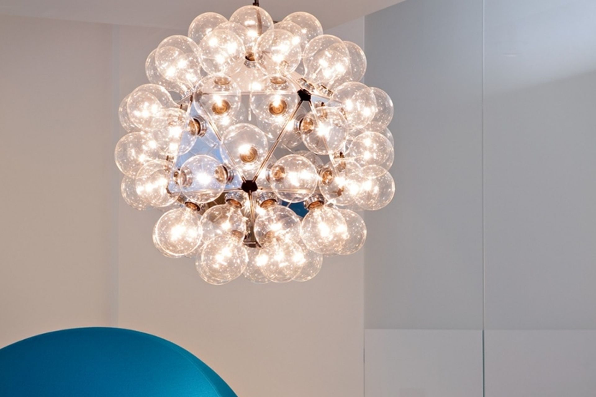 The Taraxacum suspension fixture resembles elegant Christmas baubles with metallic accents. 2. Nature's Noel 