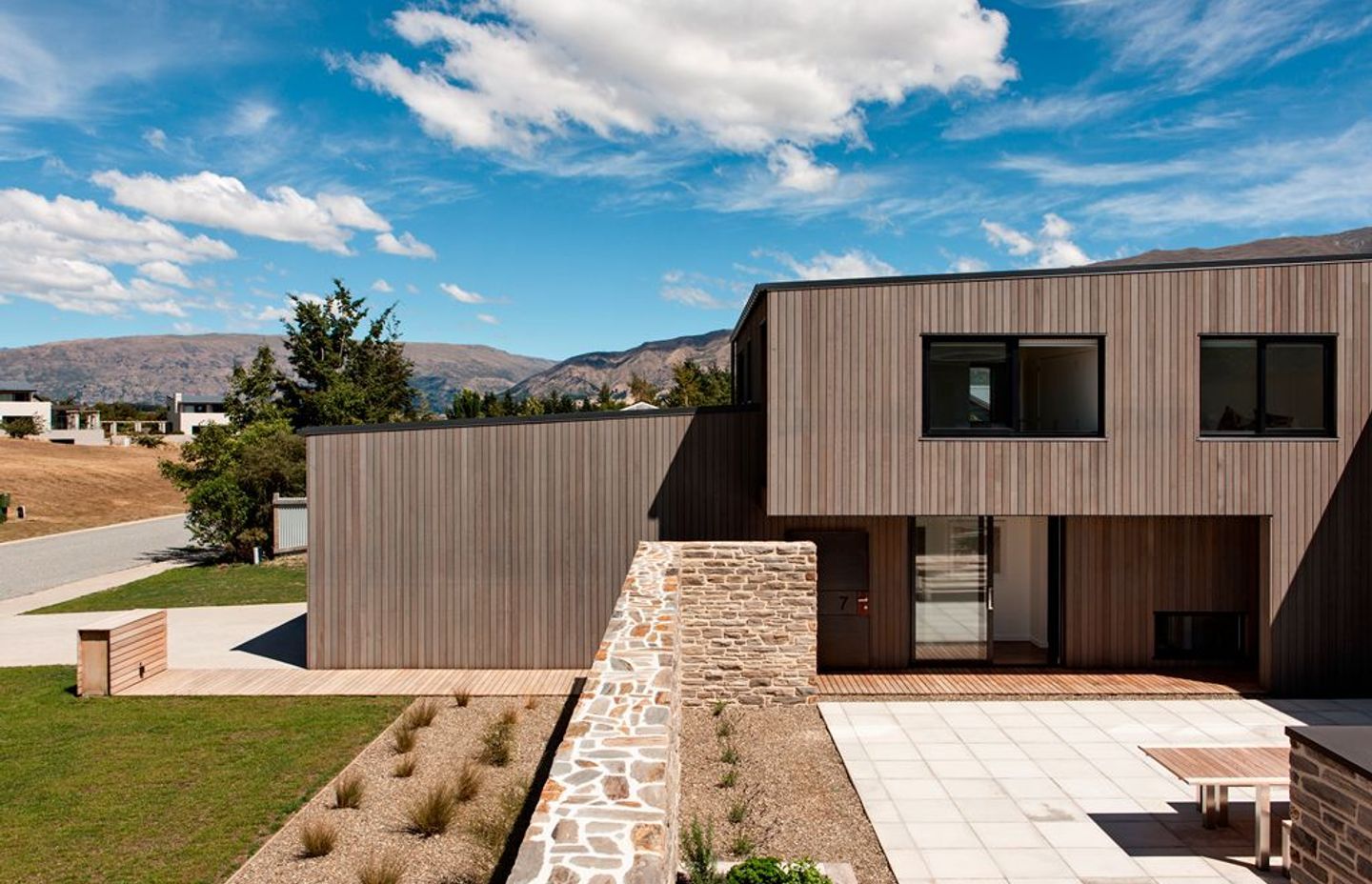 Briar Bank House project by Rafe Maclean Architects uses the INTERSET® Recessed Window Flashing System with vertical cedar cladding