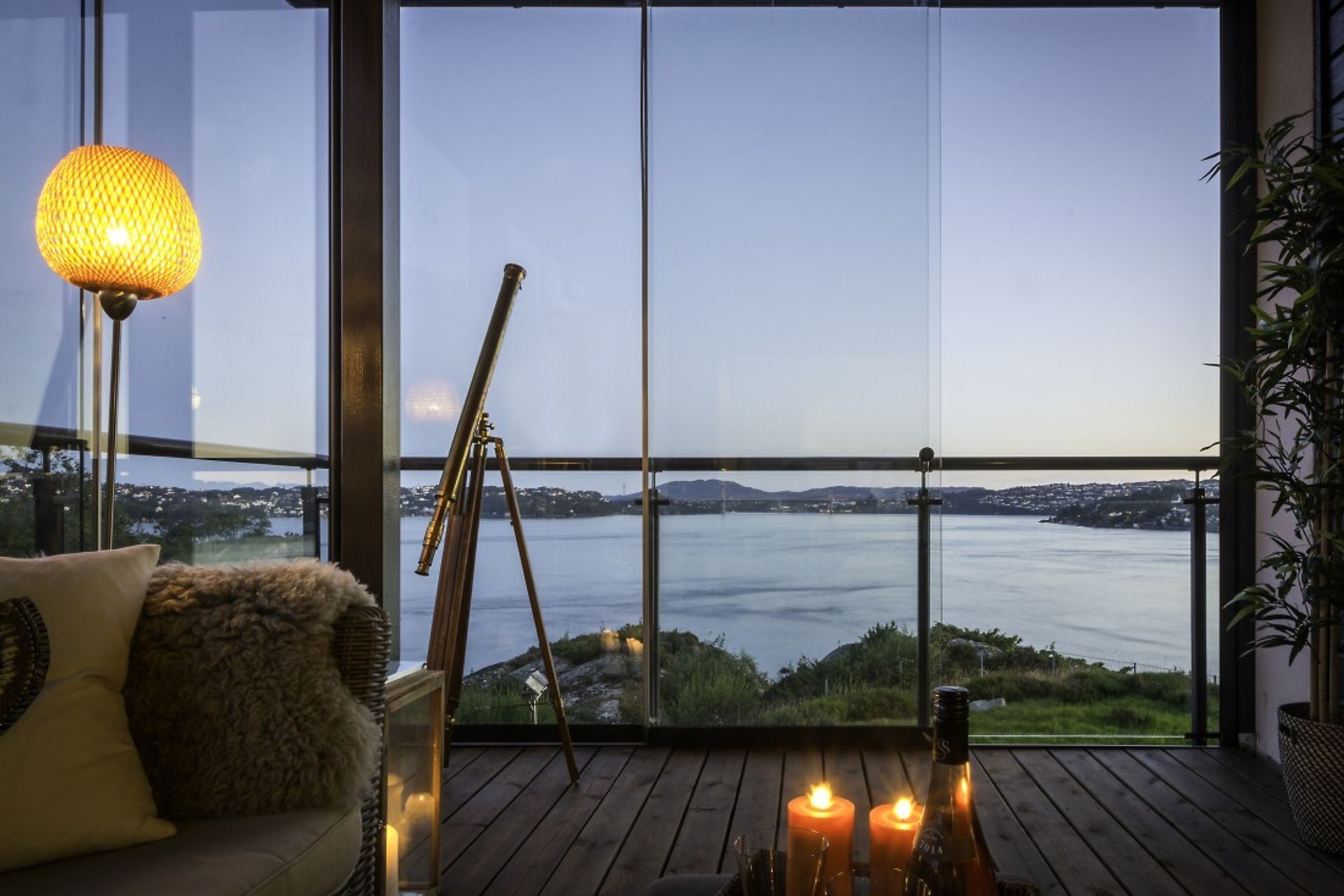 Sunflex sliding glass protecting a decking area