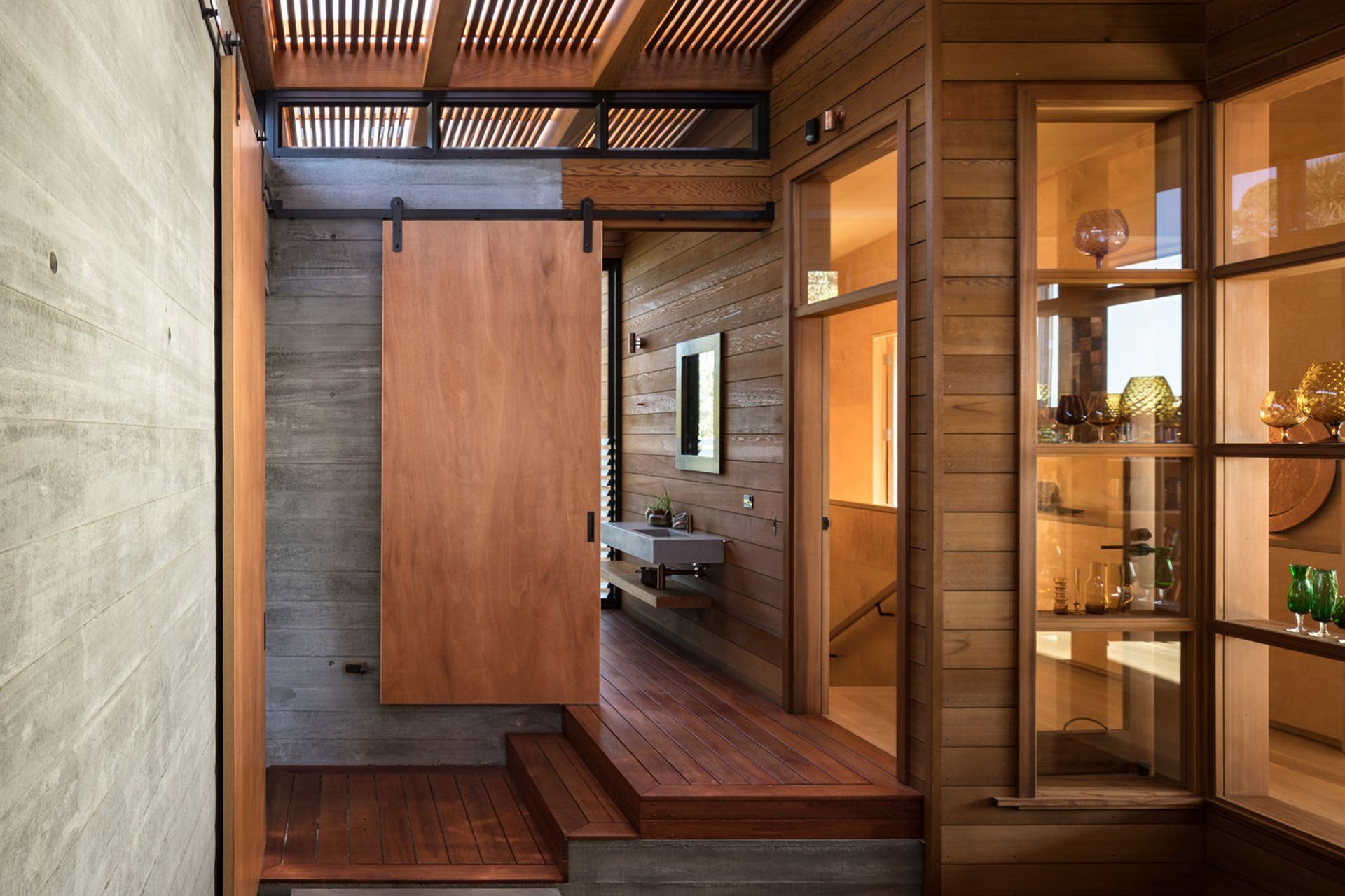 The cedar-lined courtyard is Mark's favourite space in the house: “The boys like working with cedar and it smells great... when you walk in the door 15 years later,, it will still smell it.”