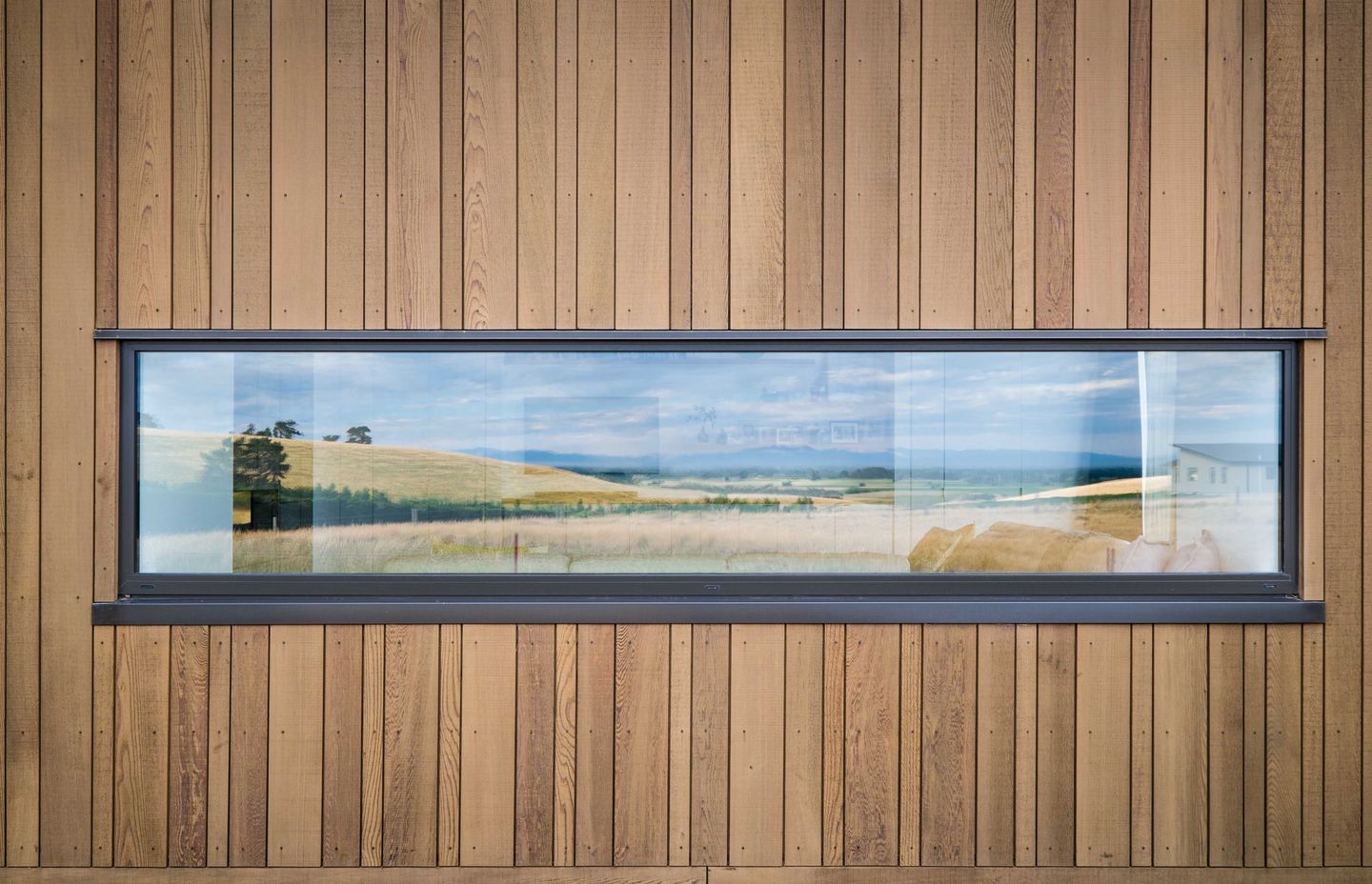 This Dalman Architecture project uses the INTERSET® Recessed Window Flashing System with random width cedar cladding