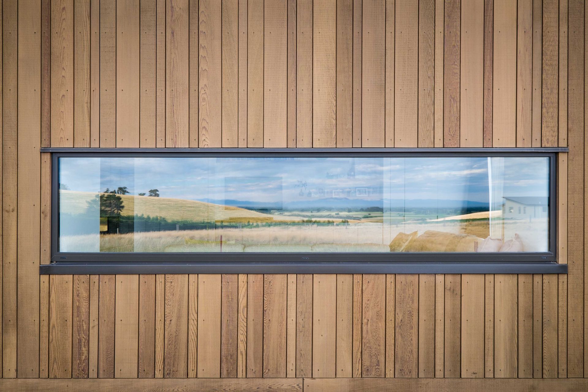 This Dalman Architecture project uses the INTERSET® Recessed Window Flashing System with random width cedar cladding