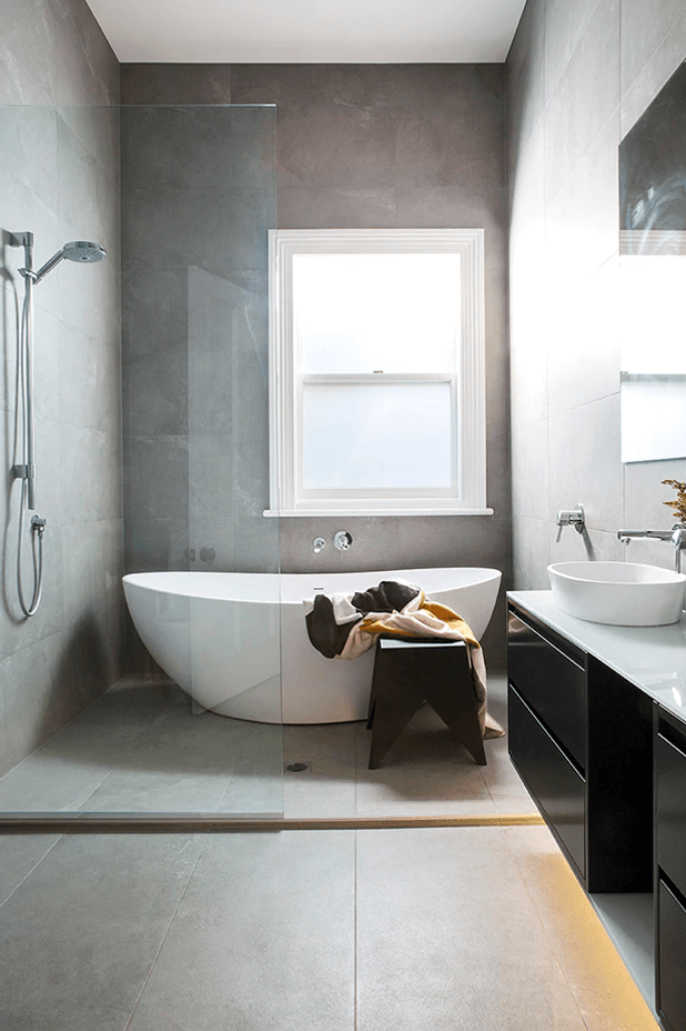 A freestanding tub is the ultimate luxury, but leave enough room around it for cleaning.