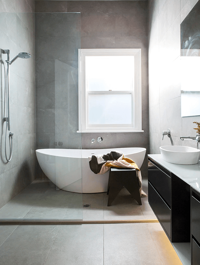 A freestanding tub is the ultimate luxury, but leave enough room around it for cleaning.