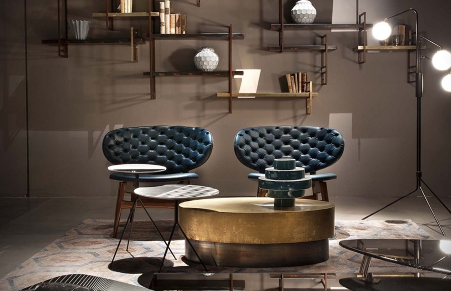 The matte antiqued copper and glossy chromed steel of this Baxter Loren coffee table from Cavit & Co shows the chic eclectic mix of sleek, sharp industrial materials.