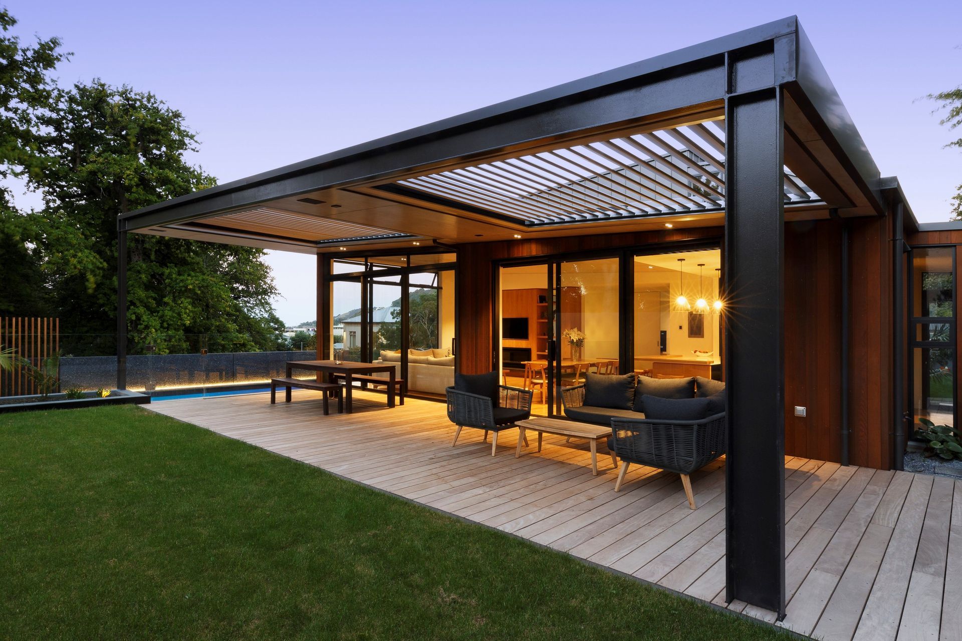 The west facing patio captures evening sun, and is sheltered with an operable louvred roof.