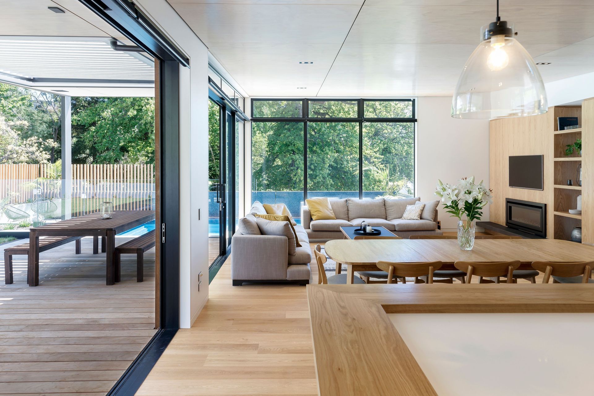 The lounge and outdoor dining area viewed from the kitchen.
