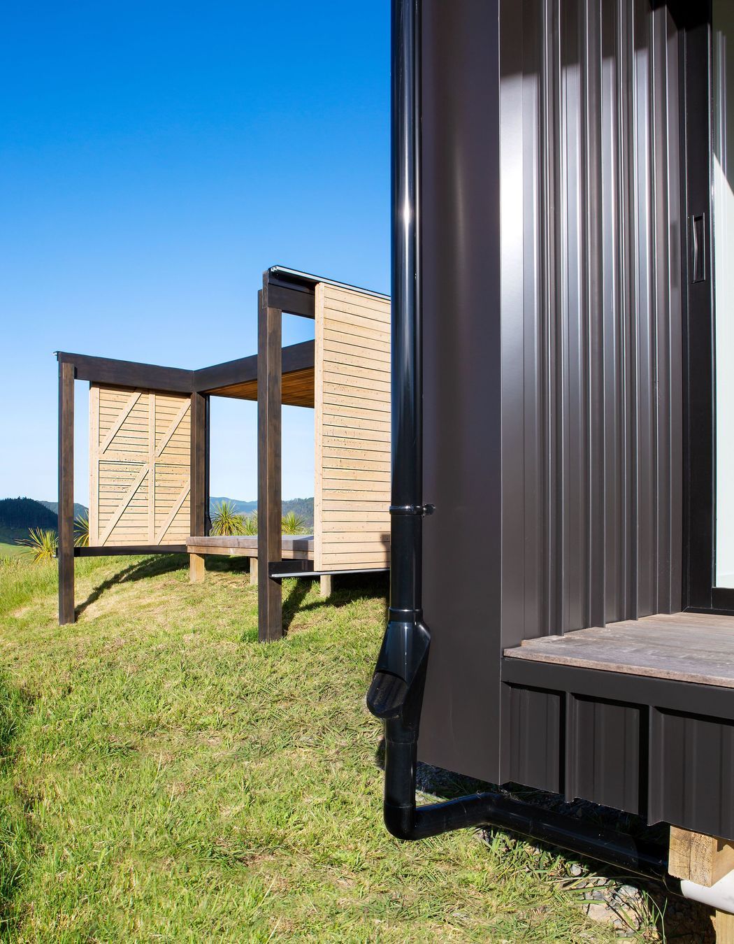 The barn-style doors allow for protection from sun and the elements.